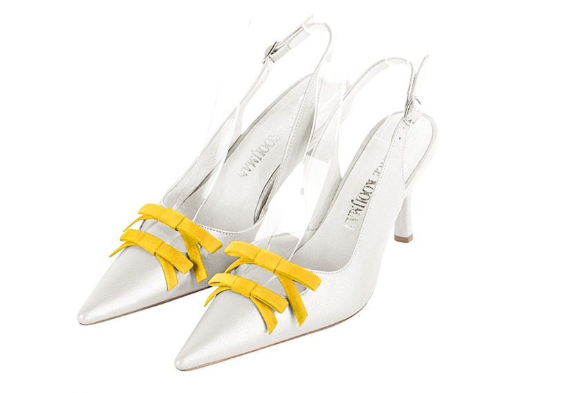 Women's pure white and yellow elegant slingback heels, with a bow on the front. Pointed toe. High slim heel - Front view